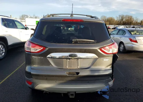 2015 Ford Escape Titanium z USA, uszkodzony, nr VIN 1FMCU9J98FUB06549